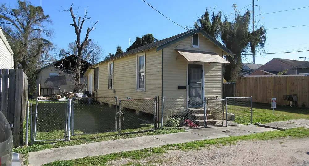A raised New Orleans shotgun house of the kind commonly treated for rats